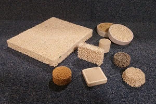 Refractory ceramics and metal processing products including filters